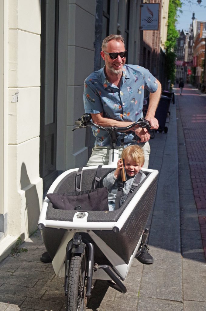 A classic bicycle child carrier in Amsterdam