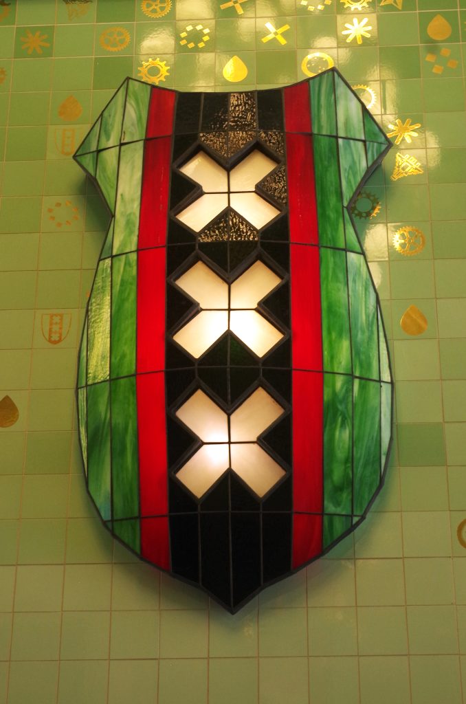 The royal coat in pedestrian mall in Amsterdam